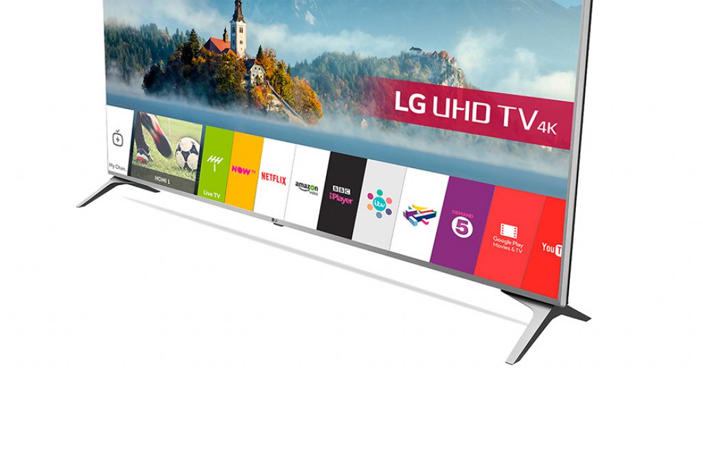 LG 60UJ651V, con diseño Ultra Slim, metálico plateado delantero y negro trasero. Peanas en V inversa plateadas.